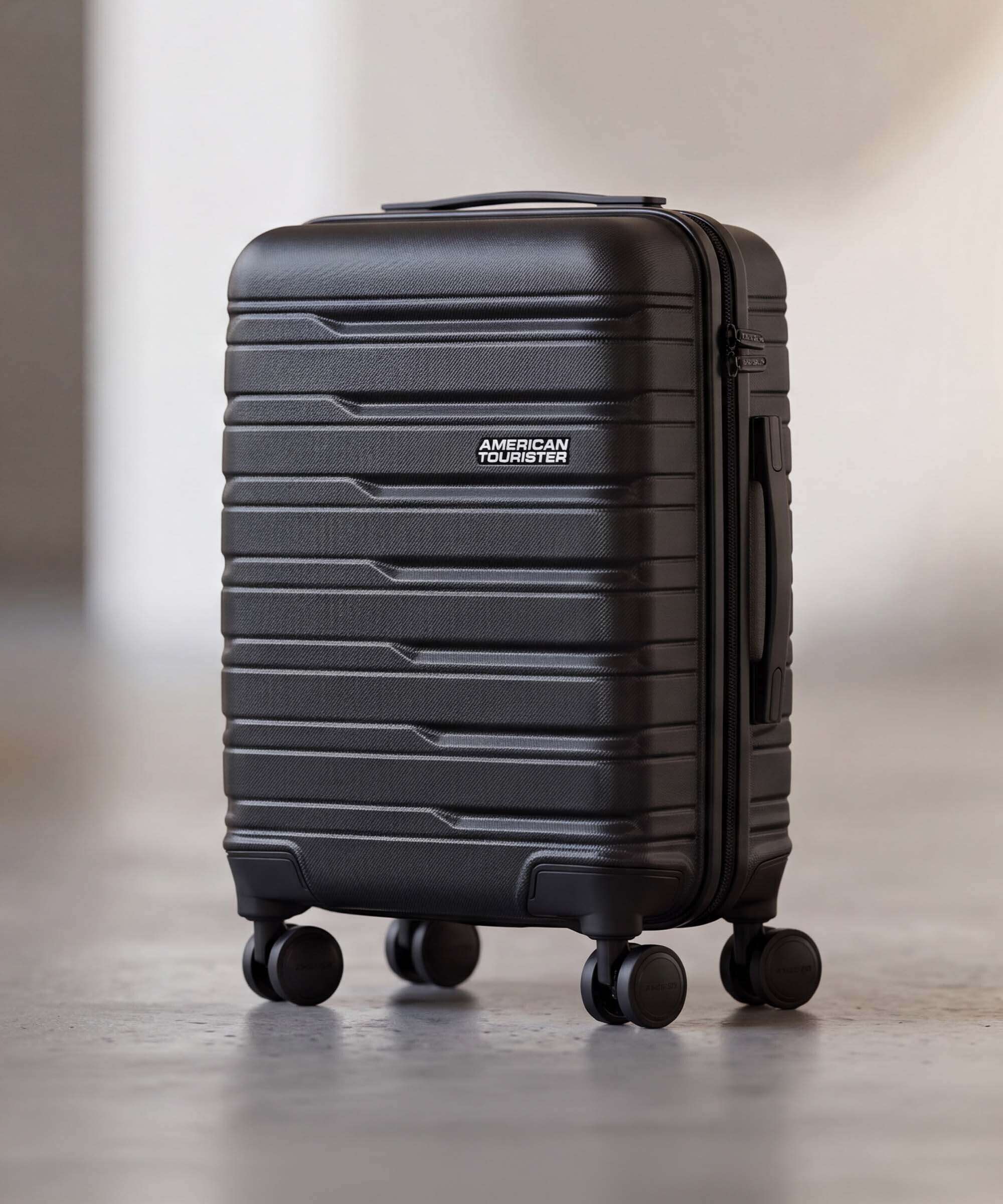 American Tourister Flashline Spinner (4 wheels) shadow black