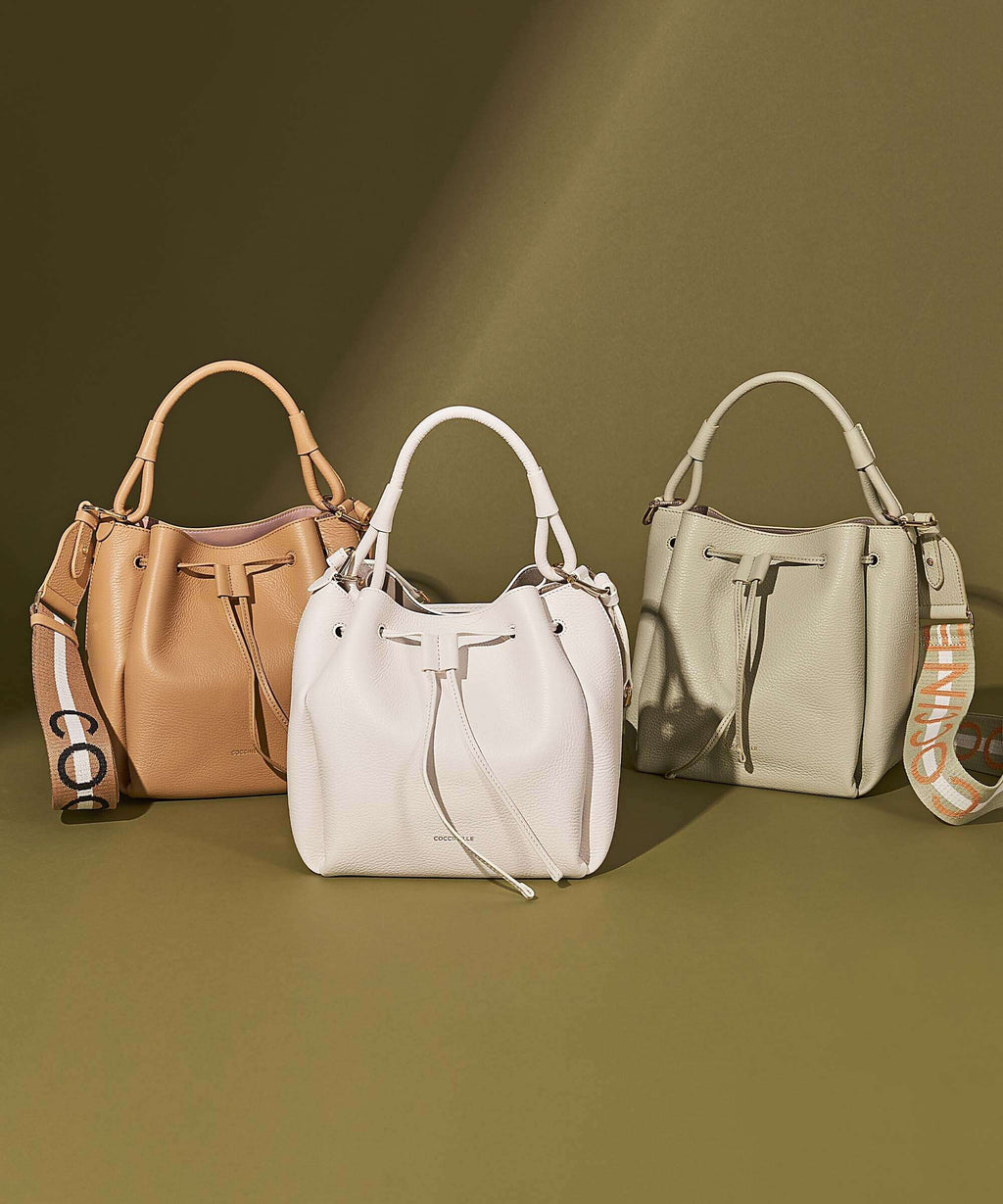 Coccinelle Eclyps Bucket bag brillant white